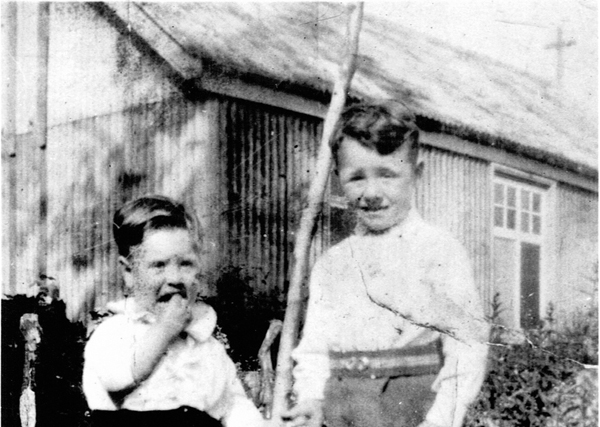 Two children in front of the Mission Room